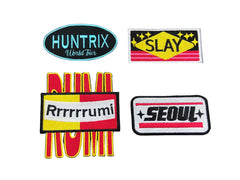 Set of colorful patches with text on a gray background