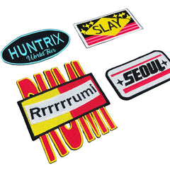 Set of colorful patches with text on a gray background