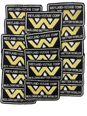 Multiple patches with Weyland-Yutani Corp logo and text on a textured background