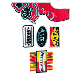 Set of colorful patches with various designs on a gray background