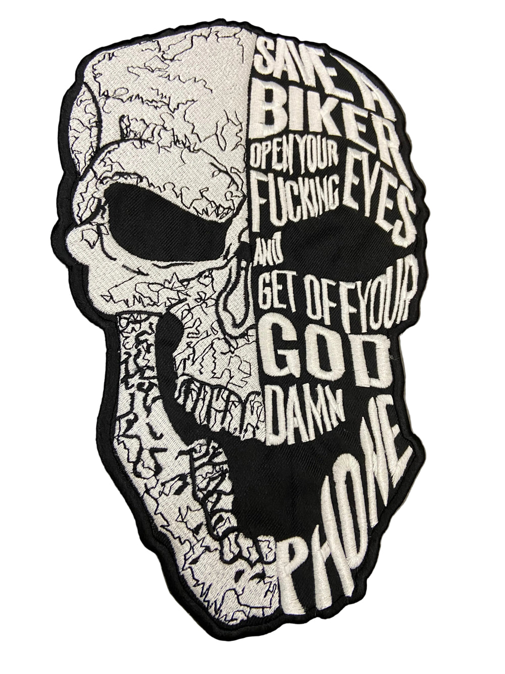 Skull-shaped patch with text on a gray background