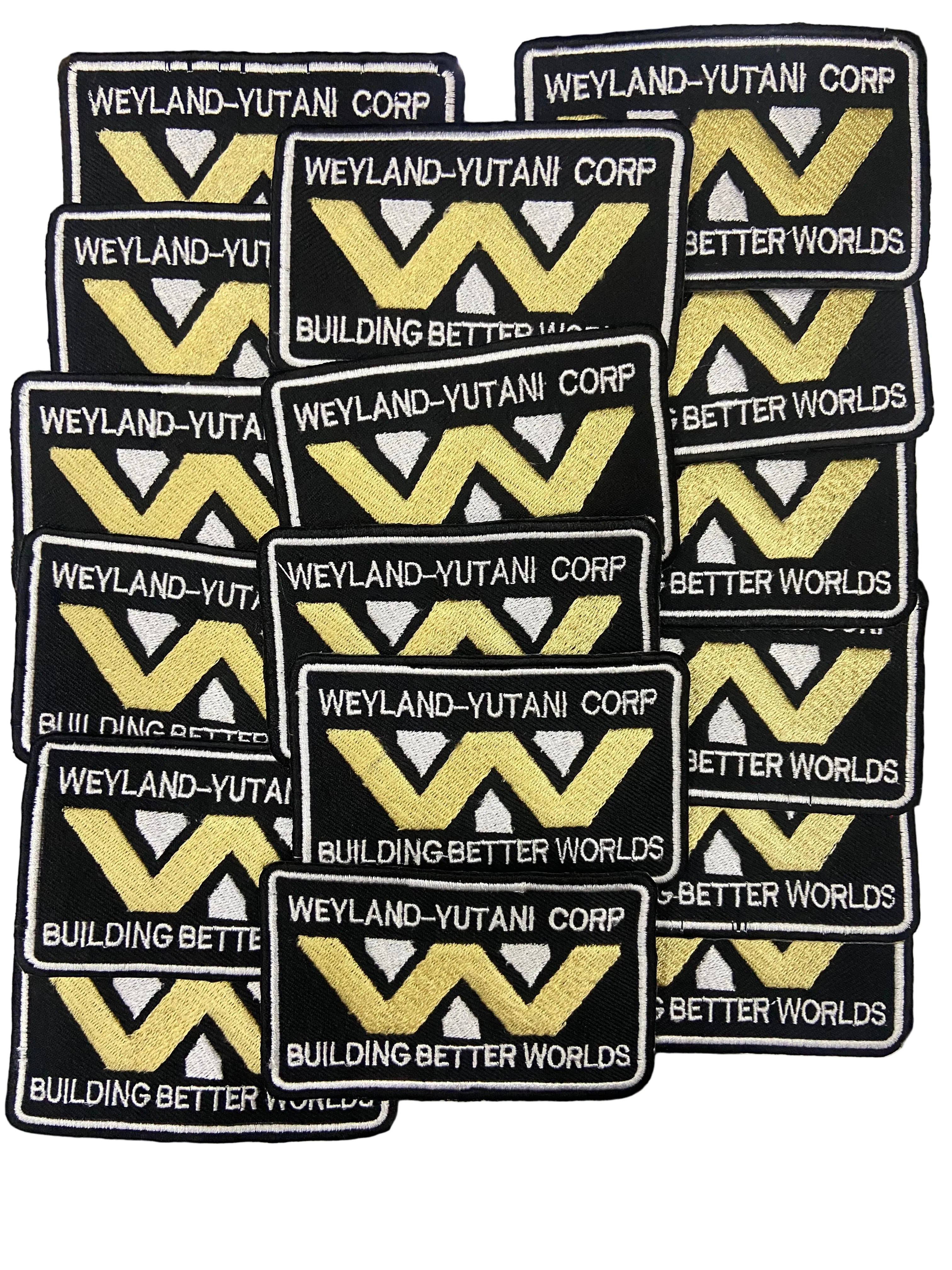 Multiple patches with Weyland-Yutani Corp logo and text on a textured background