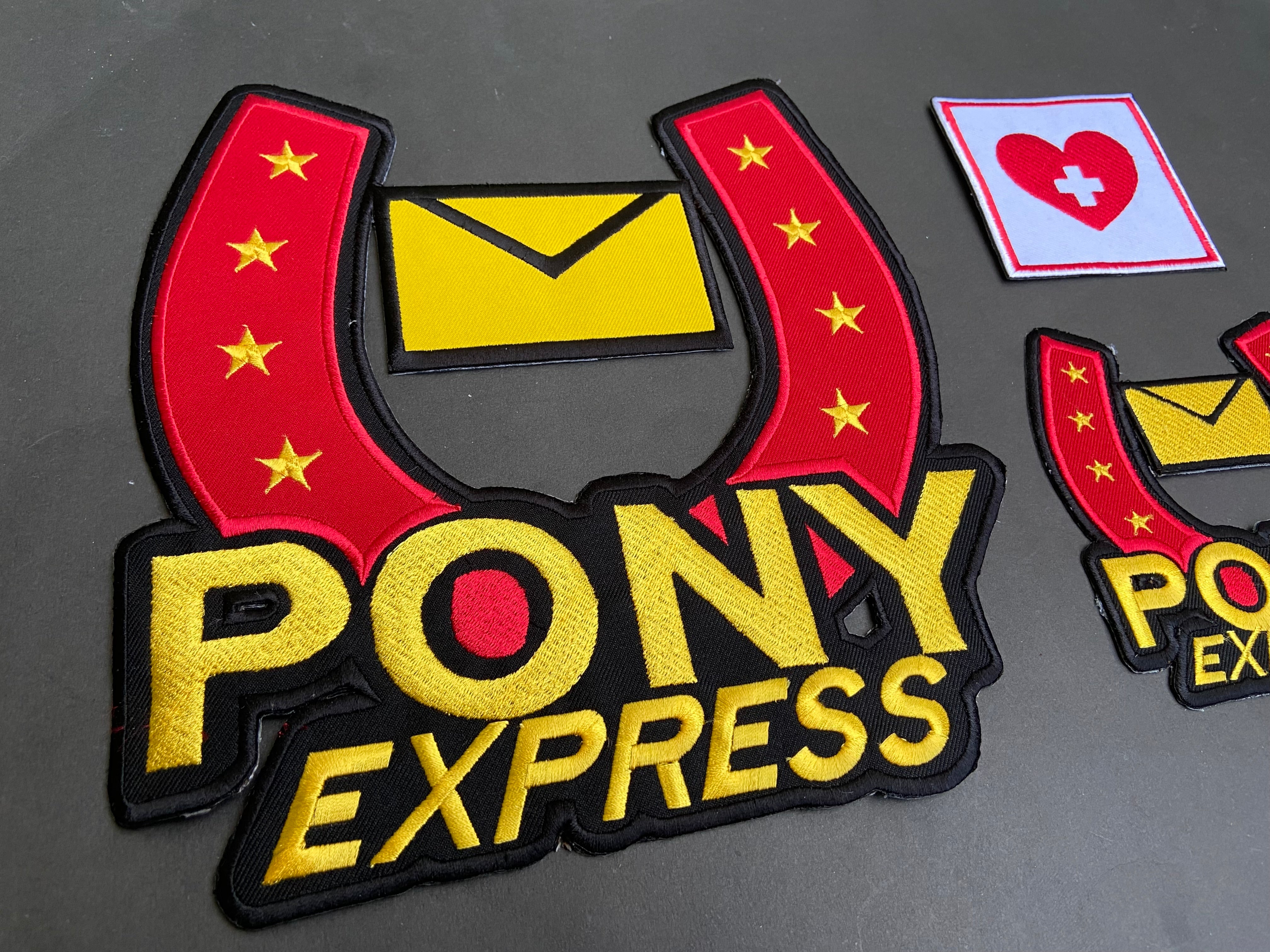 Pony Express logo patch with red and yellow colors on a dark background