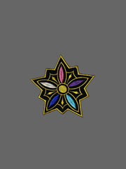 Decorative patch with a star-like design on a textured gray background
